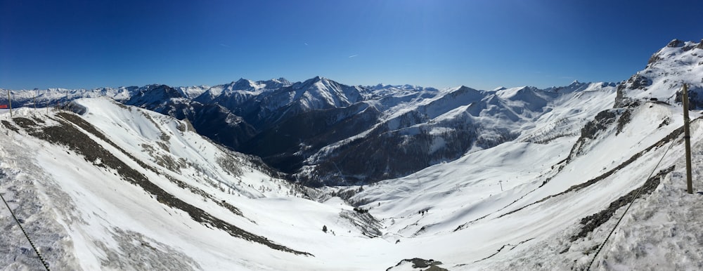 snow covered mountain under blue sky during daytime