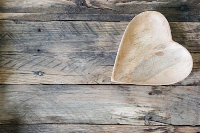 A beautifully crafted handmade wooden bowl showcasing rustic charm.