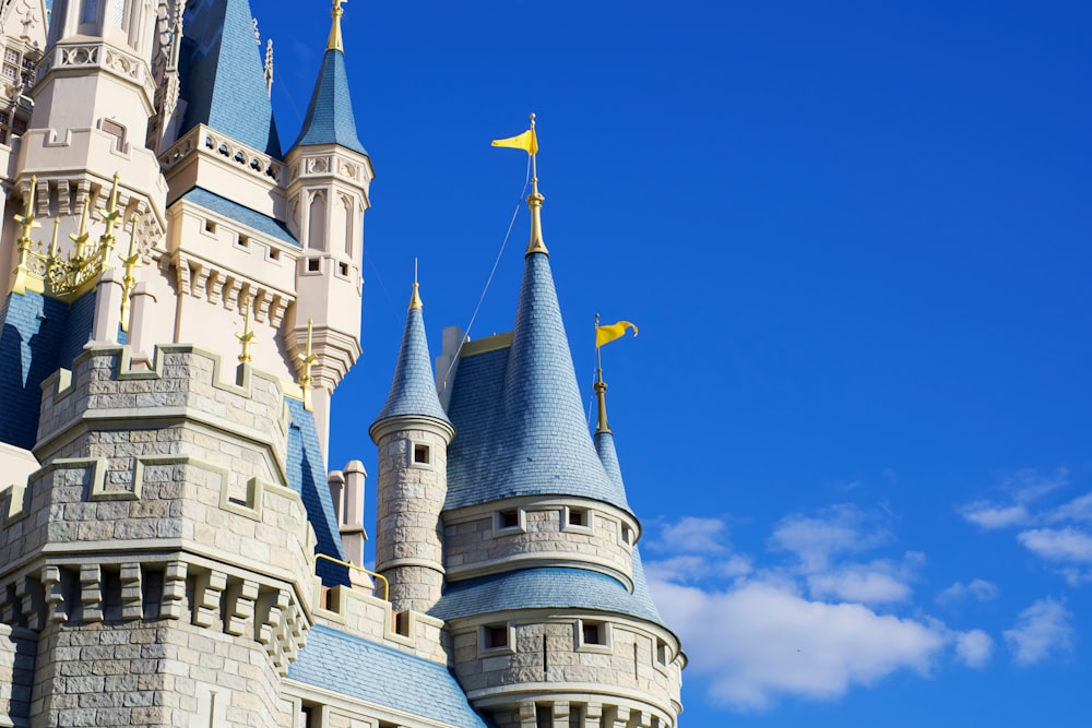 white and blue castle under blue sky during daytime