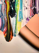 A vibrant canvas filled with swirling colors representing artistic exploration