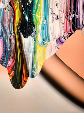 A vibrant canvas filled with swirling colors representing artistic exploration