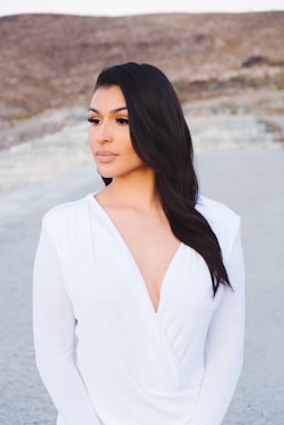 woman in white long sleeve shirt