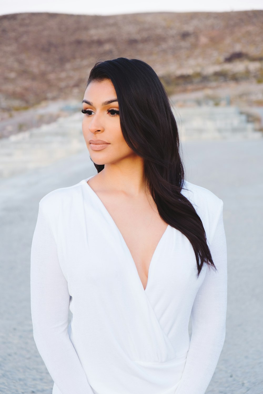 woman in white long sleeve shirt