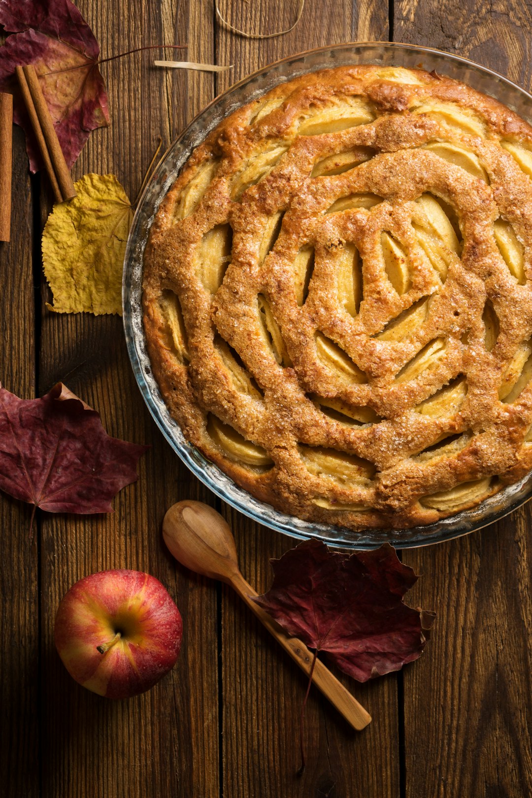 Apple pie on wooden background