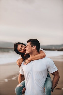photography poses for couples,how to photograph man in white crew neck t-shirt hugging woman in white t-shirt