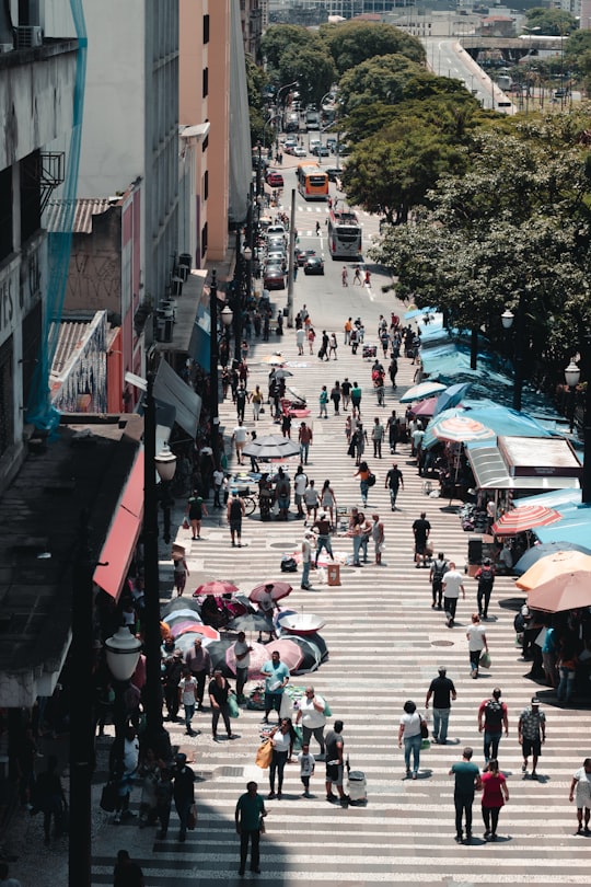 people walking on street during daytime in Centro Brasil