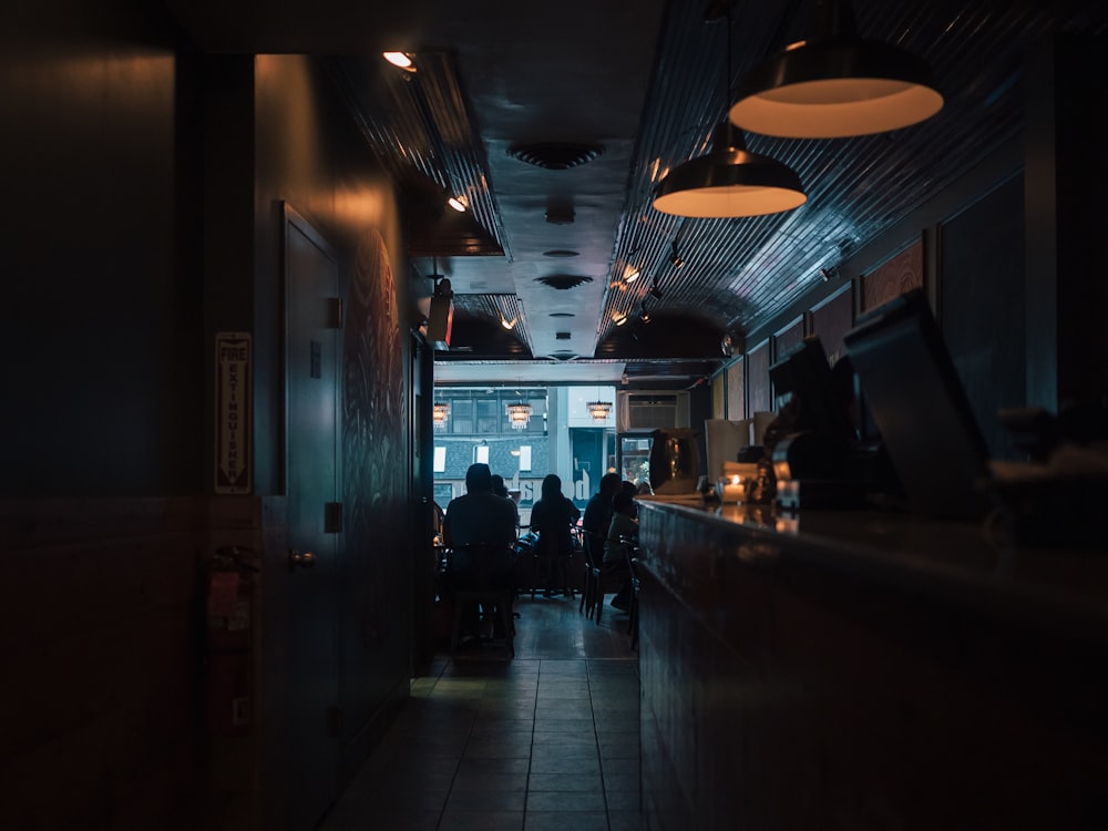 people sitting on chair inside building