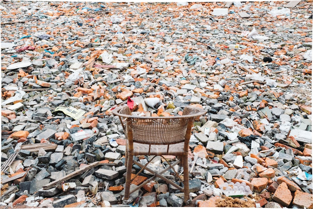 brown wooden chair on brown dried leaves during daytime