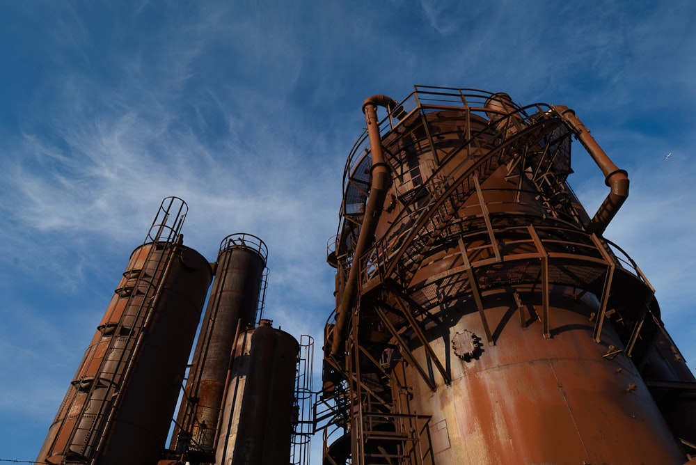 brown metal tower under blue sky