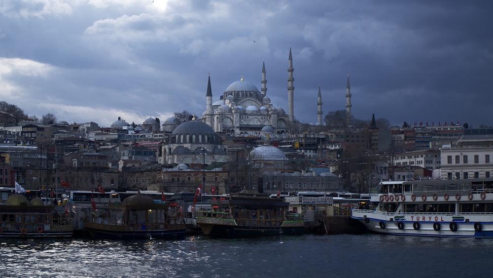 white and gray dome building under white clouds during daytime