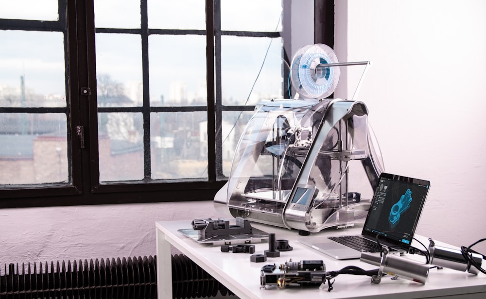 black and silver electronic devices on white table