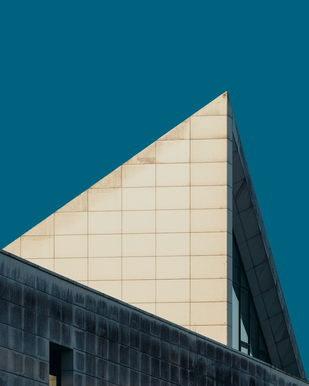 white concrete building under blue sky during daytime