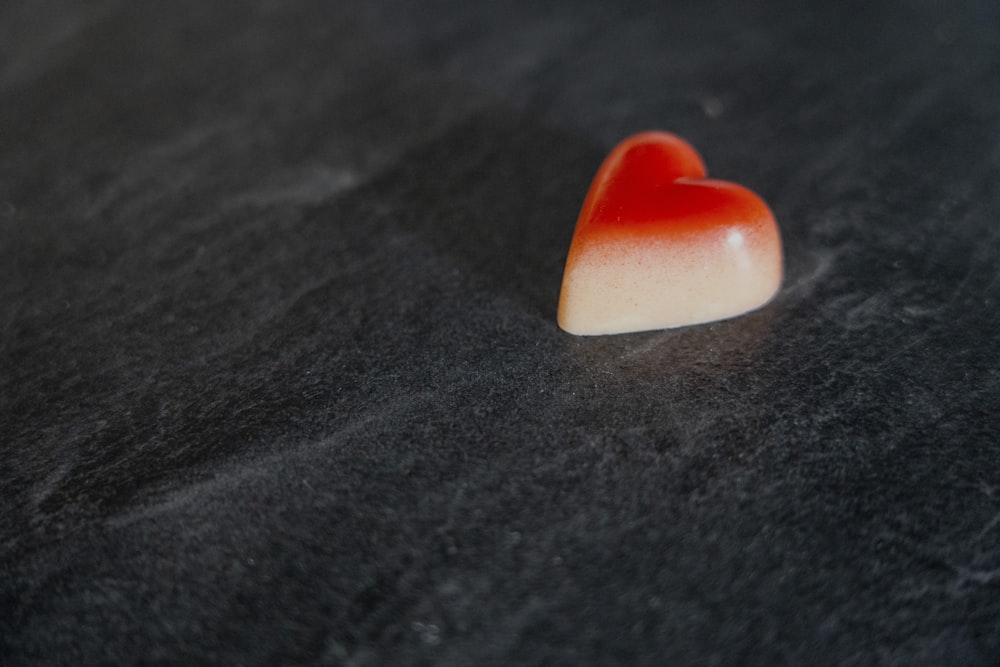 white and orange heart shaped ornament