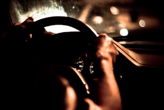 person driving car during night time