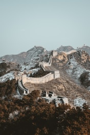 aerial view of gray concrete building on top of mountain during daytime