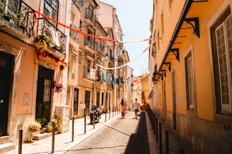 people walking on sidewalk during daytime