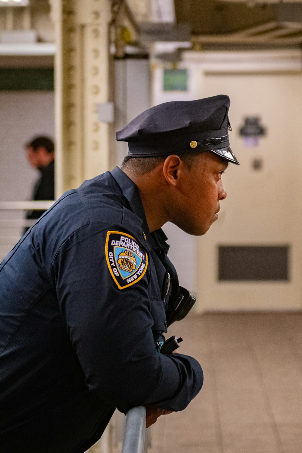 man in blue police uniform