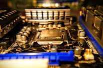 Close-up of a high-performance CPU chip resting on a motherboard, highlighting intricate details.