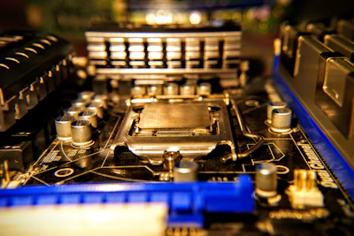 Close-up of a high-performance CPU chip resting on a motherboard, highlighting intricate details.