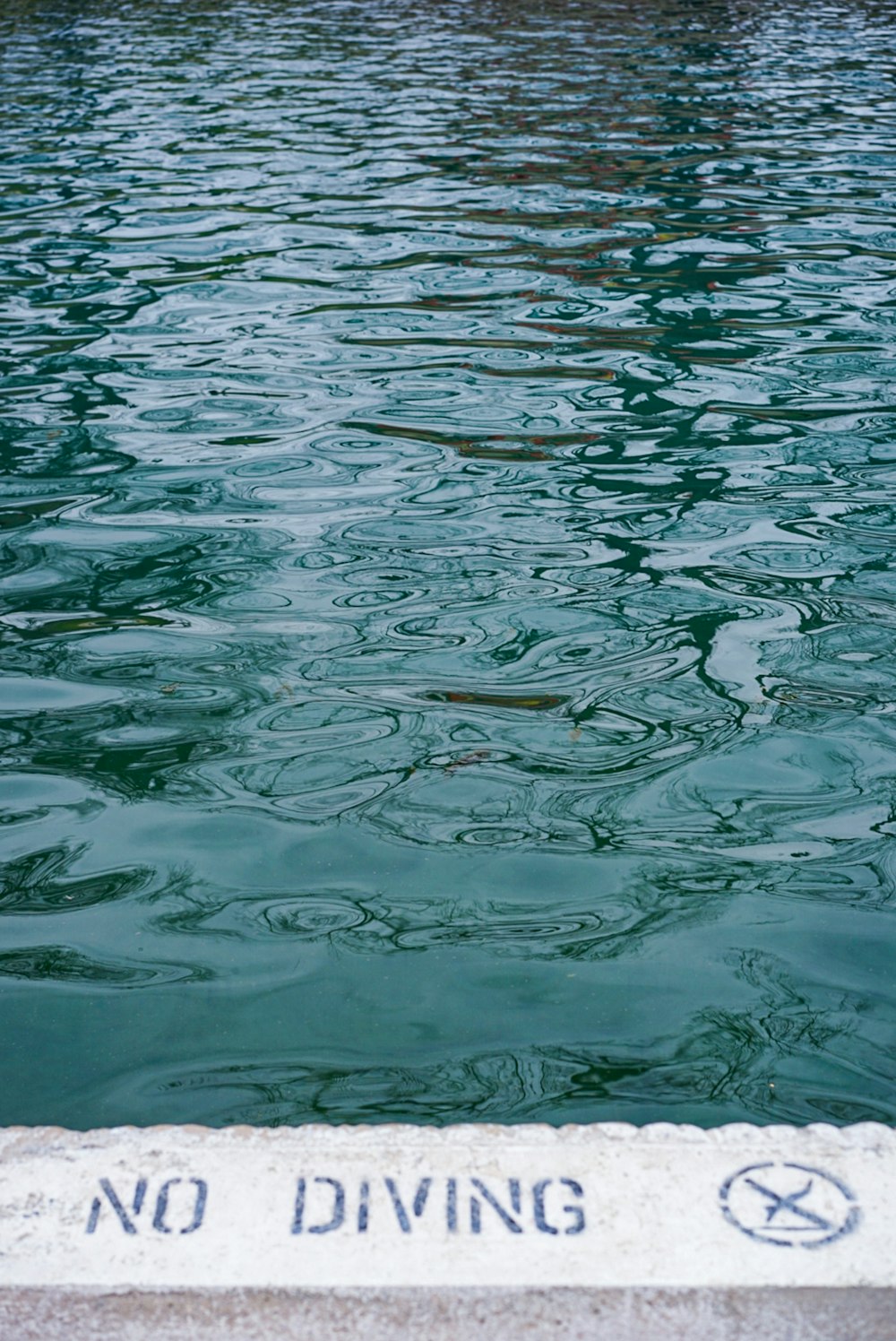 green and white water during daytime