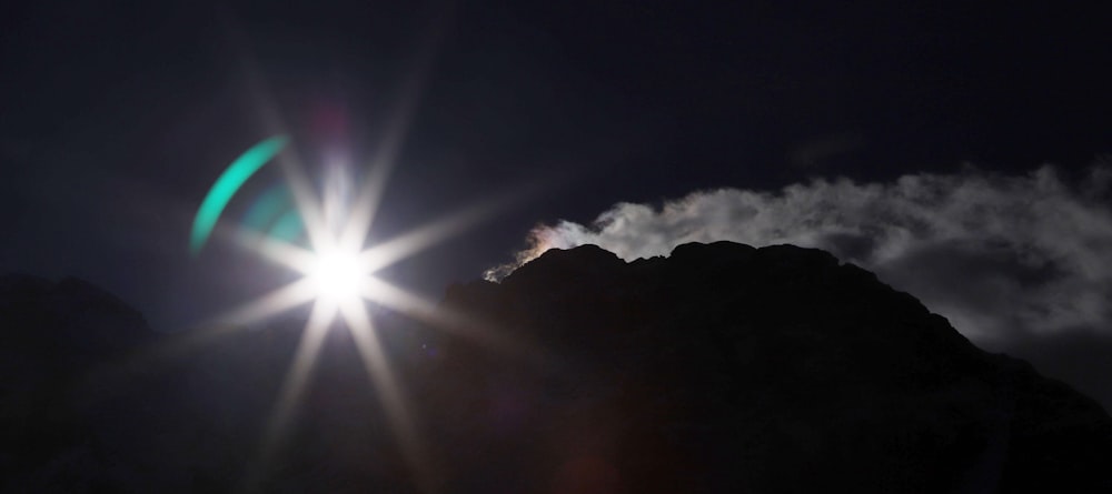 sun light on black mountain