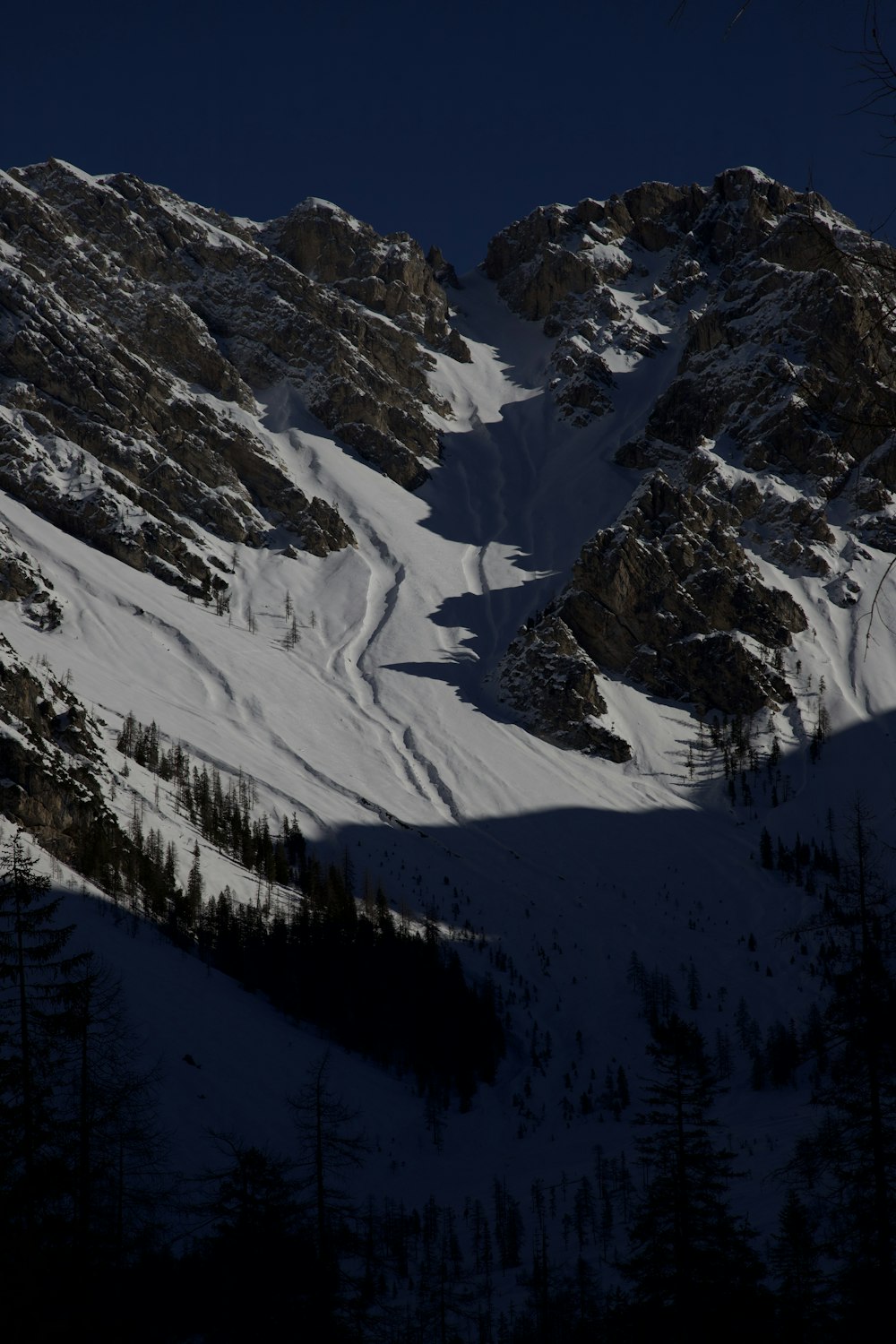 snow covered mountain during daytime