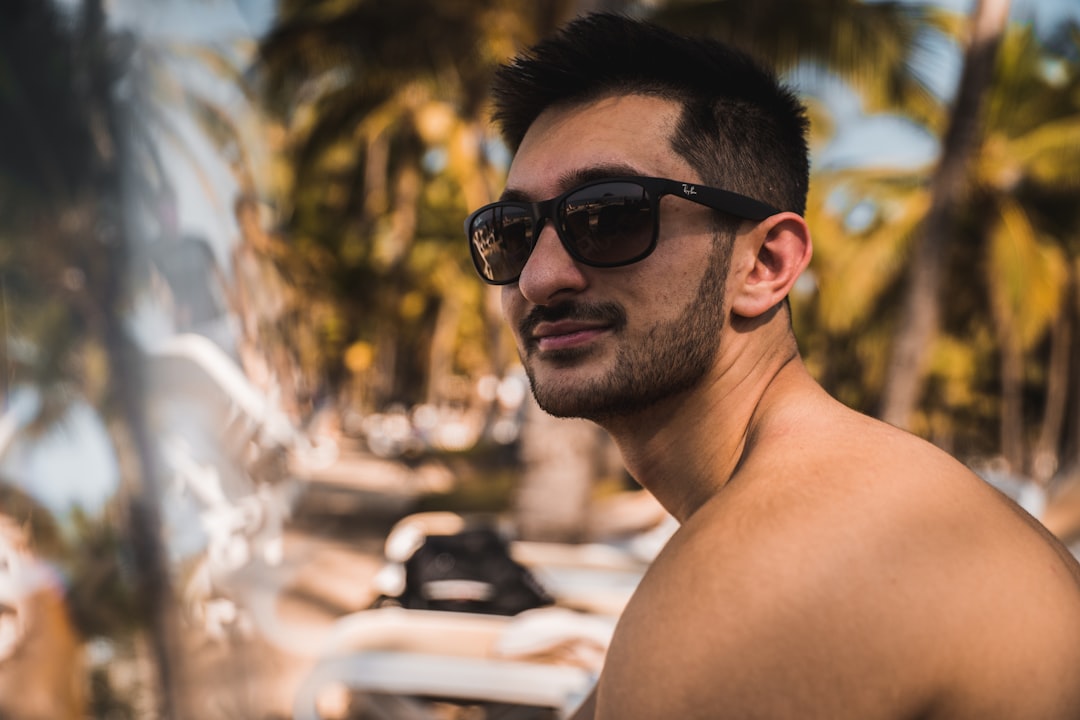 man wearing black sunglasses during daytime