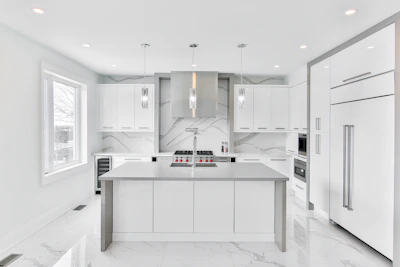 Modern kitchen with sleek countertops and elegant cabinetry.