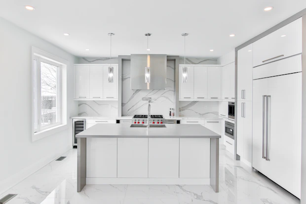 A sleek modern kitchen renovation with high-end finishes and natural light.