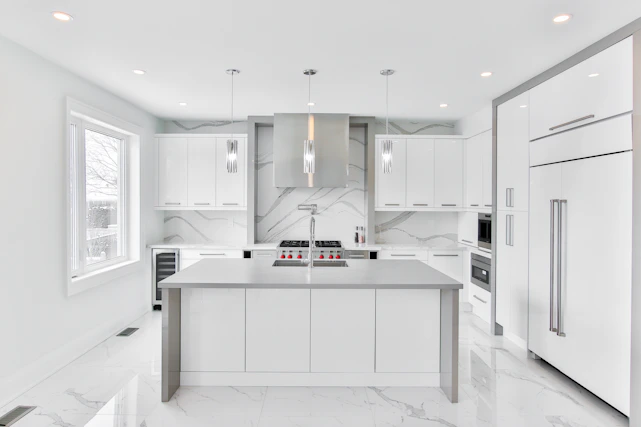 Modern custom kitchen with elegant finishes and bright lighting.