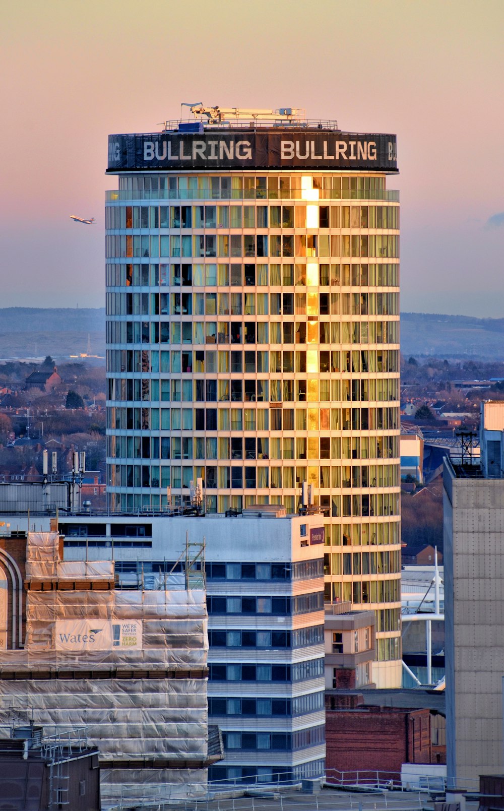 yellow and black high rise building