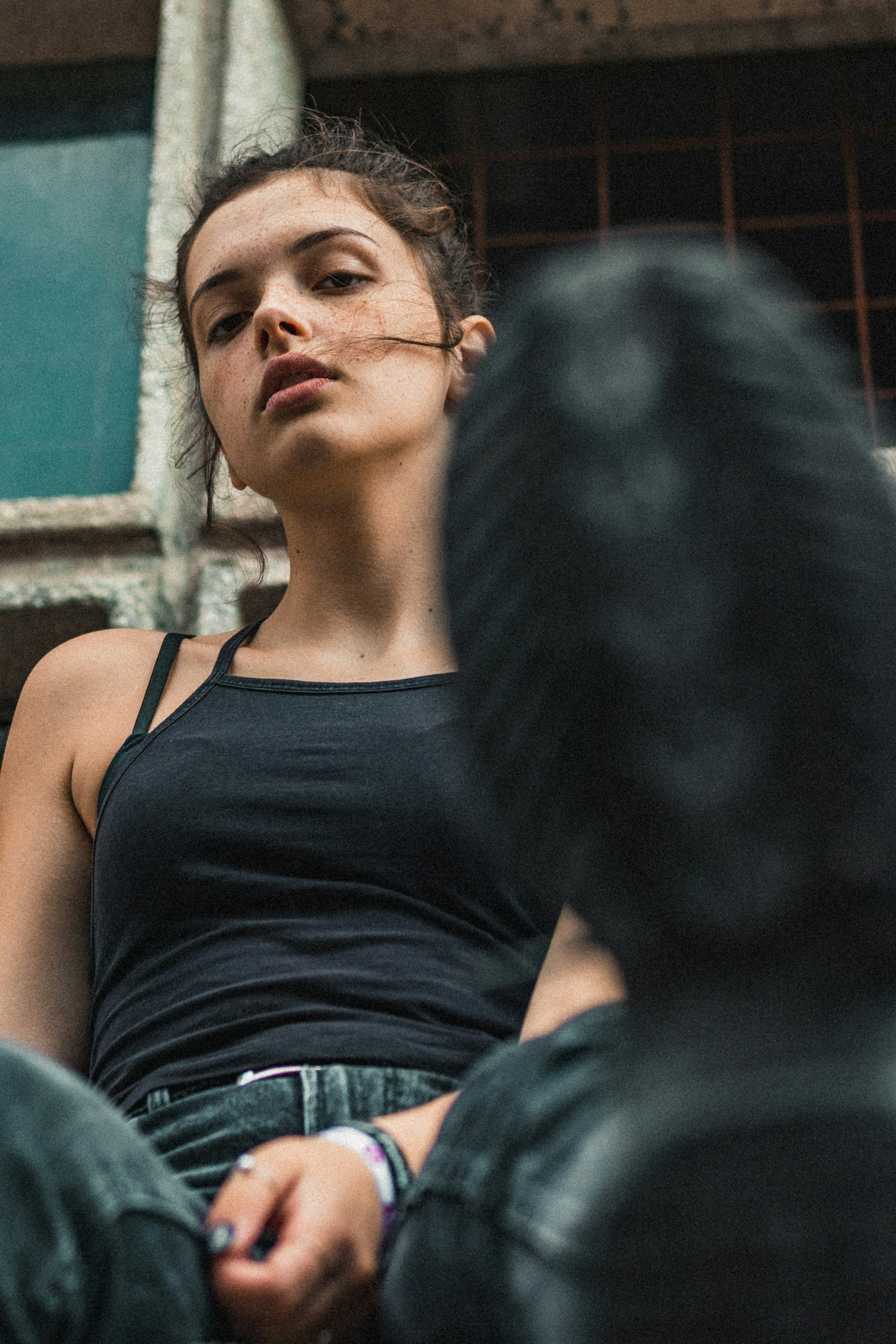 woman in black tank top