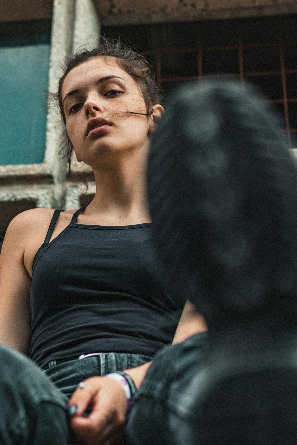 woman in black tank top