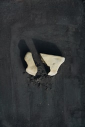 white heart shaped on black surface