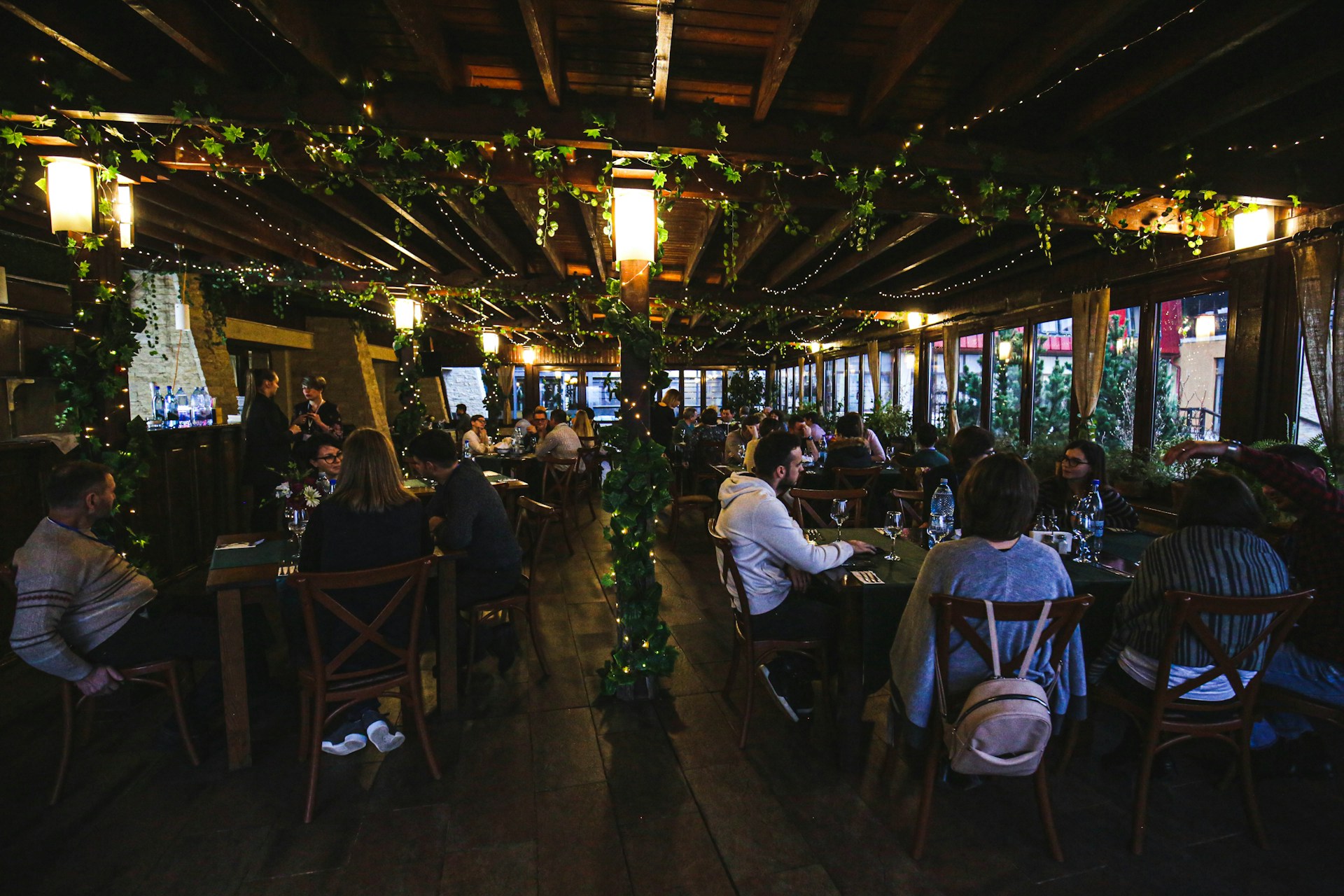 woman wearing yellow long-sleeved dress under white clouds and blue sky during daytime