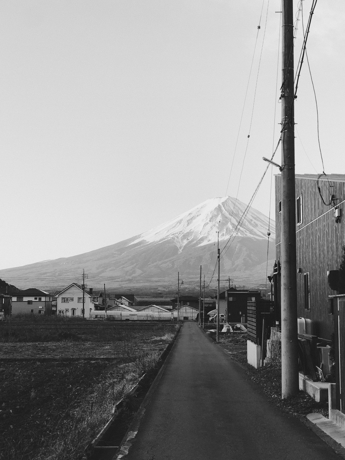 Rural Japanese road with Mt. Fuji in the background