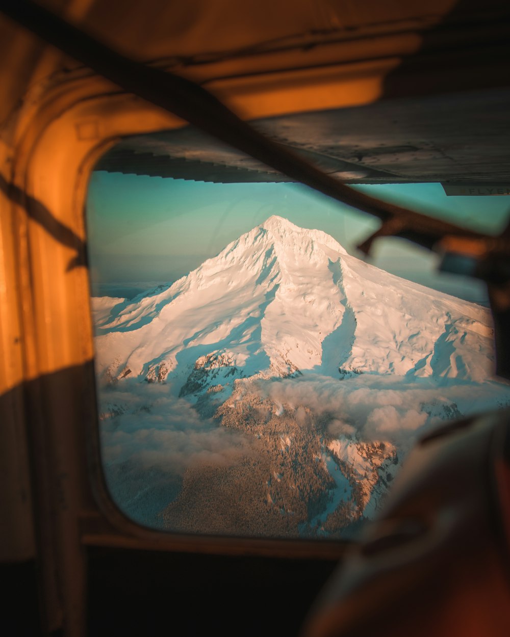 snow covered mountain during daytime