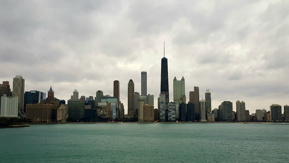 high rise buildings near sea during daytime