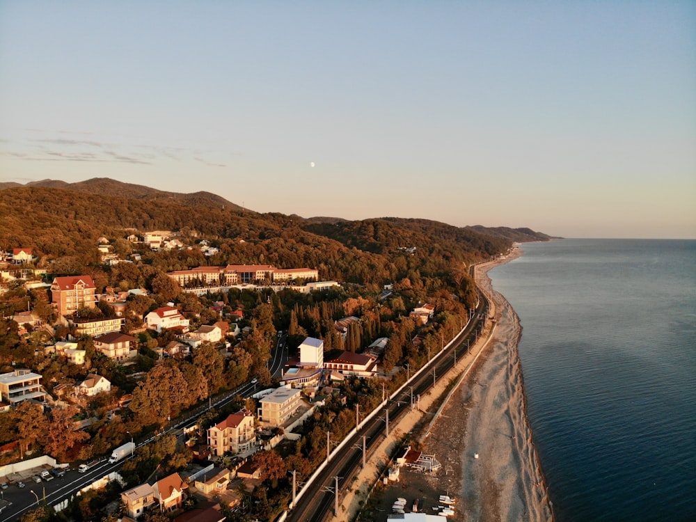 aerial view of city near body of water during daytime