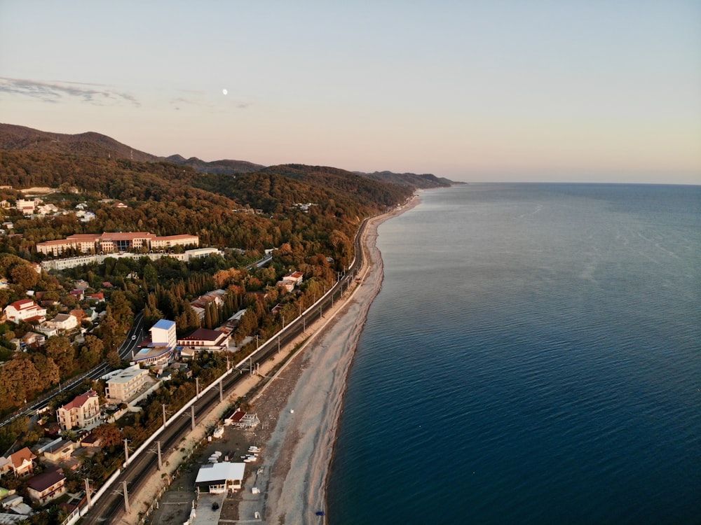 aerial view of city near body of water during daytime