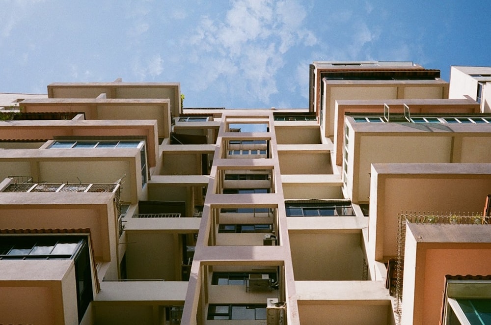 white concrete building under blue sky during daytime