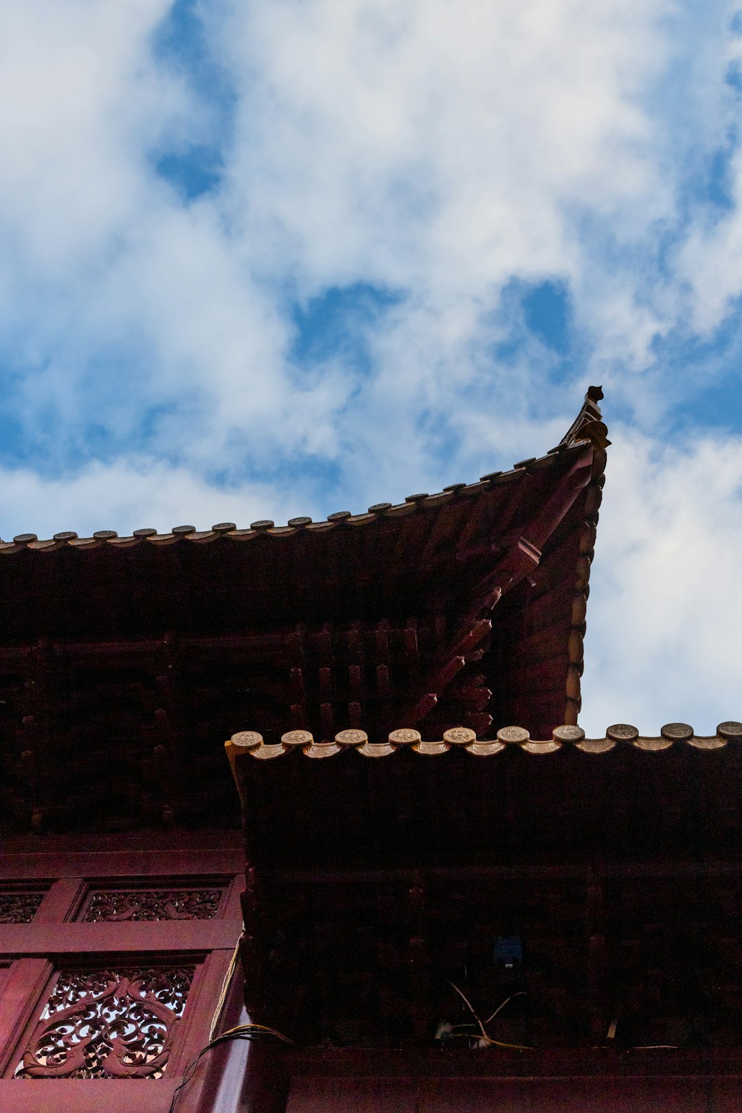 brown concrete building under blue sky during daytime