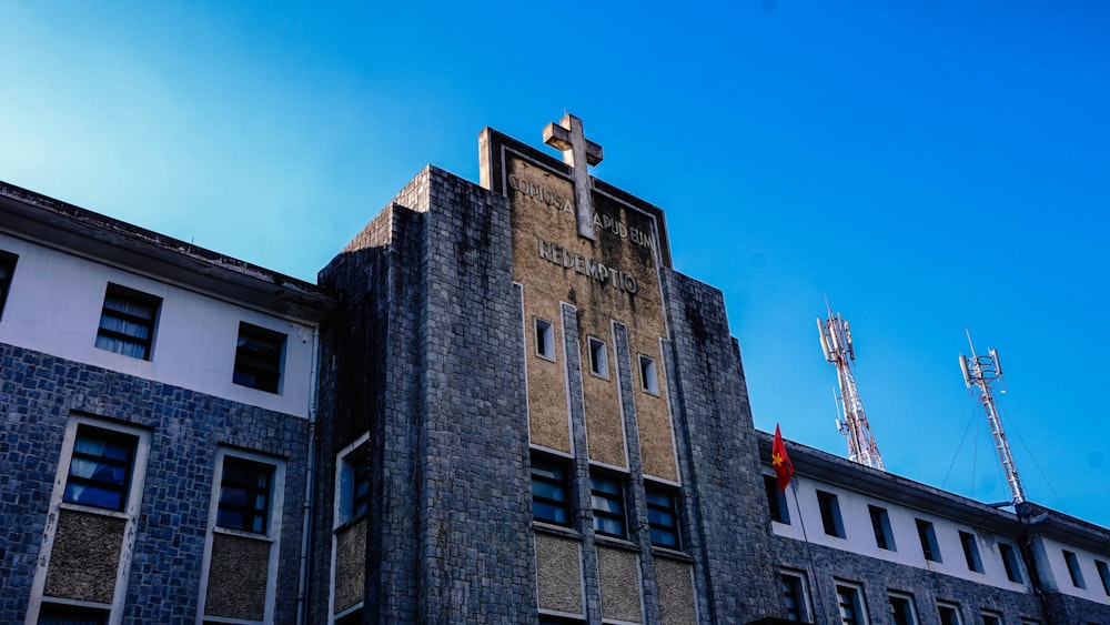 brown concrete building under blue sky during daytime