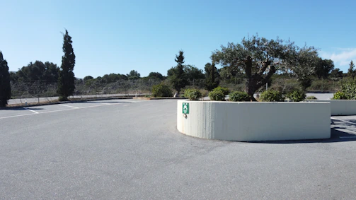 Close-up of a spacious empty lot with clear boundaries and natural surroundings.
