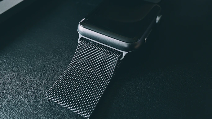 Close-up of a wearable device gently adhering to skin, highlighting texture and fit.