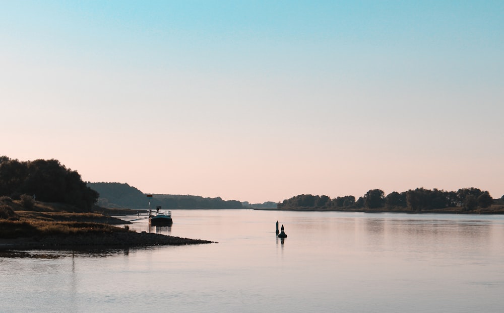 a large body of water with a boat in it