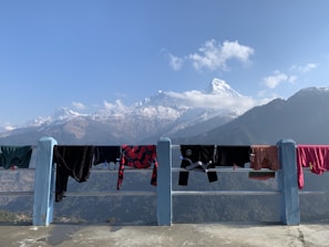 A scenic view of a mountain landscape with our apparel featured.