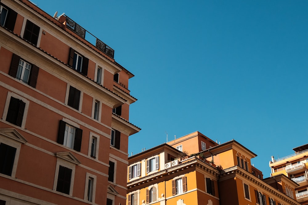 brown concrete building under blue sky during daytime