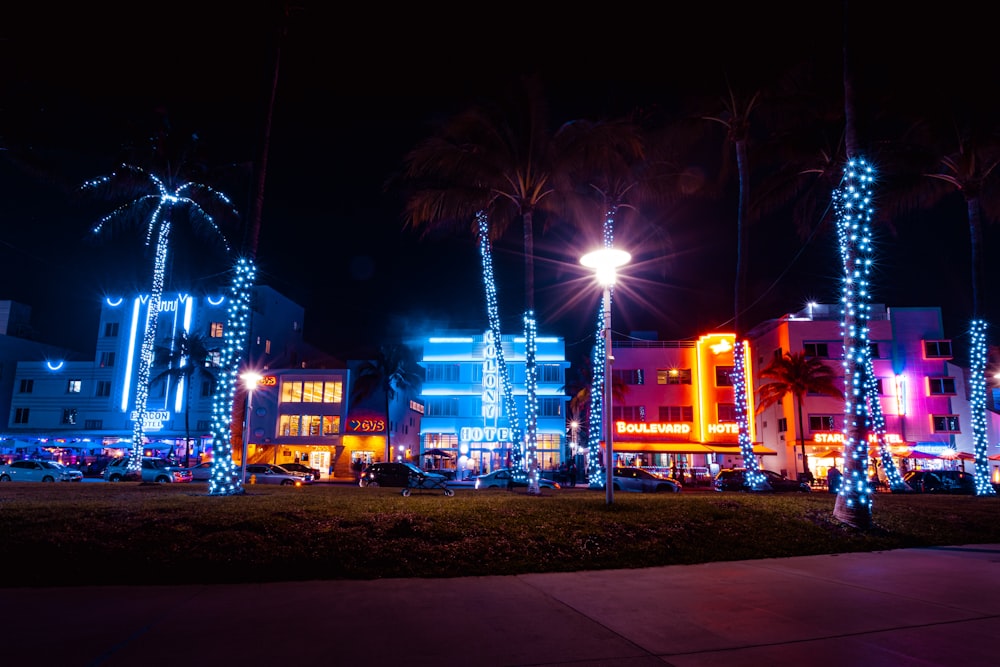 people walking on street during night time