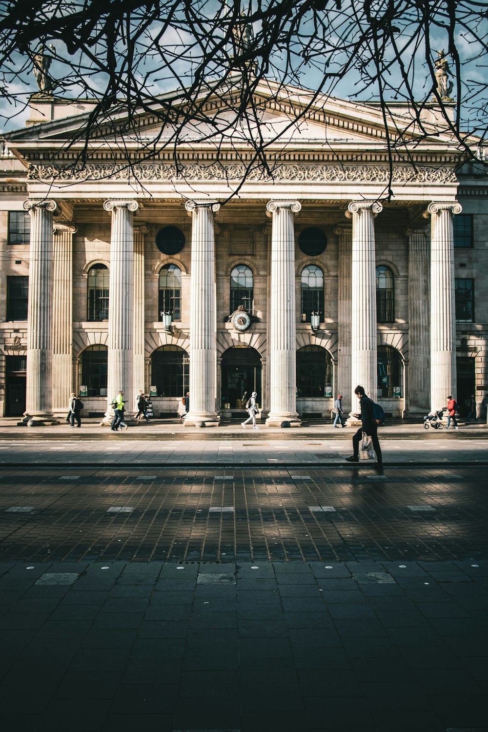 people walking on gray concrete floor during daytime